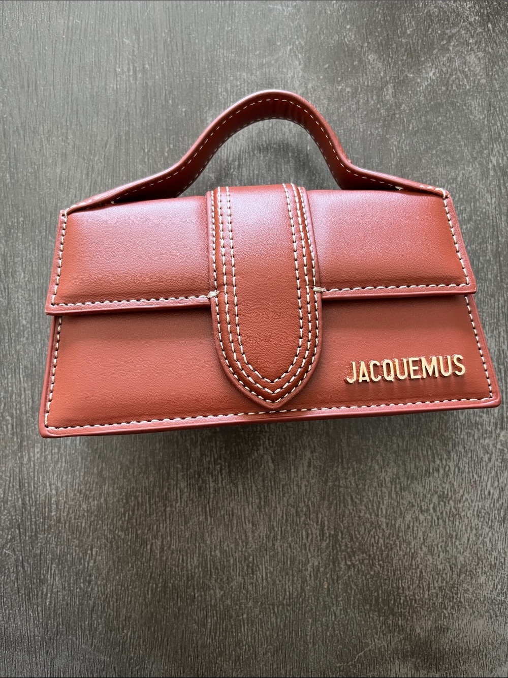 Jacquemus brown leather mini top-handle bag with gold logo